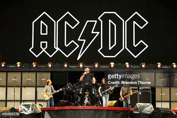 Perform on stage during a media call ahead of their 'Rock or Bust' world tour at ANZ Stadium on November 3, 2015 in Sydney, Australia.
