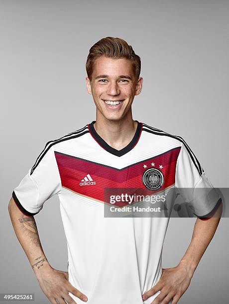 In this handout image provided by German Football Association Erik Durm of team Germany poses for a picture on May 24, 2014 in St. Martin in...