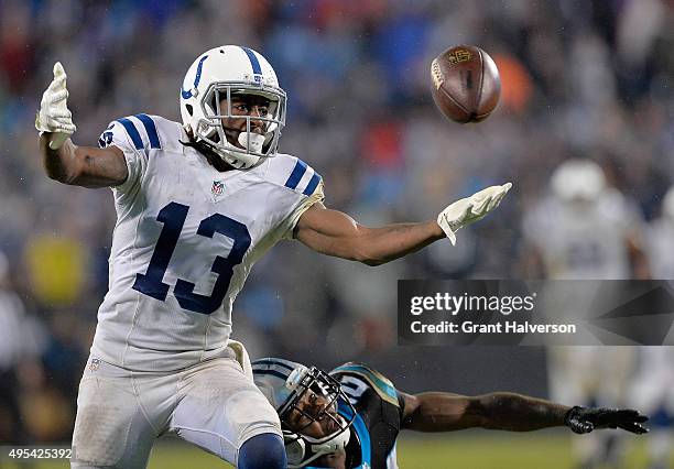 Josh Norman of the Carolina Panthers breaks up a pass intended for T.Y. Hilton of the Indianapolis Colts during their game at Bank of America Stadium...