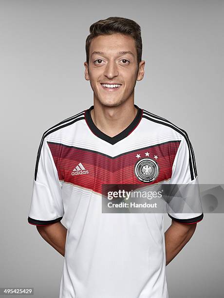 In this handout image provided by German Football Association Mesut Oezil of team Germany poses for a picture on May 24, 2014 in St. Martin in...