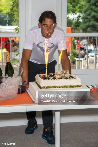 Tennis player Rafael Nadal celebrates its 28th anniversary at Roland Garros whyle the Roland Garros French Tennis Open 2014 - Day 10 on June 3, 2014...