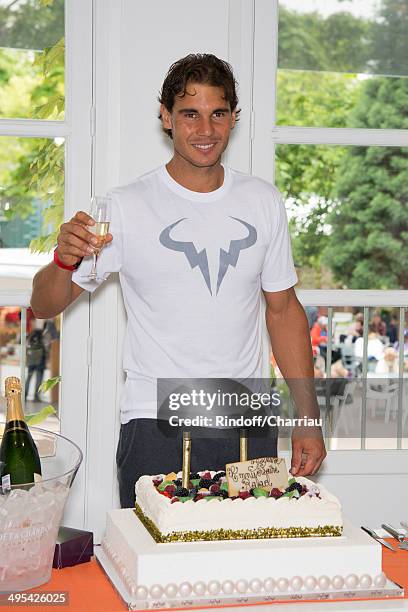 Tennis player Rafael Nadal celebrates its 28th anniversary at Roland Garros whyle the Roland Garros French Tennis Open 2014 - Day 10 on June 3, 2014...