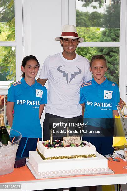 Tennis player Rafael Nadal celebrates its 28th anniversary at Roland Garros whyle the Roland Garros French Tennis Open 2014 - Day 10 on June 3, 2014...