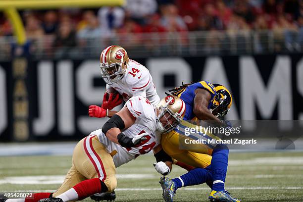 Joe Staley of the San Francisco 49ers blocks for Jerome Simpson during the game against the St. Louis Rams at the Edward Jones Dome on November 1,...