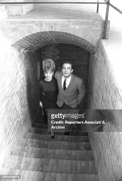 Italian actor Vittorio Gassman and Danish actress Annette Stroyberg climbing the stairs at Verona Arena while shooting the film Barabbas. Verona, 1961