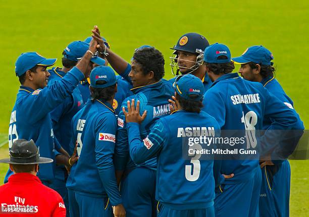 Ajantha Mendis of Sri Lanka celebrates taking the wicket of Ian Bell of England during the England v Sri Lanka fifth one day international match at...