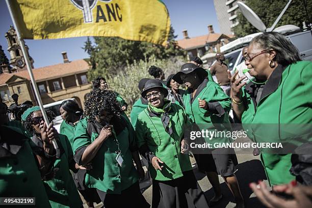 South African ruling party African National Congress women league members sing and dance as they protest against Oscar Pistorius outside the appeal...