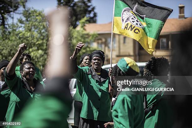 South African ruling party African National Congress women league members sing and dance as they protest against Oscar Pistorius outside the appeal...