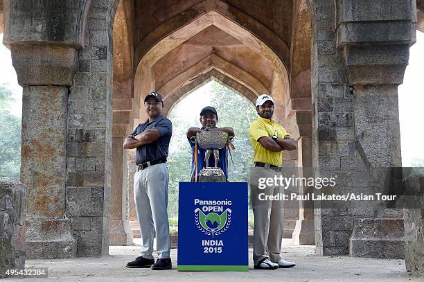 Rahil Gangjee of India, Mithun Perera of Sri Lanka and Chiragh Kumar of India pose with the winner's trophy ahead of the Panasonic Open India at...