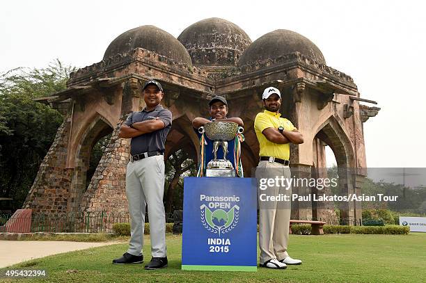 Rahil Gangjee of India, Mithun Perera of Sri Lanka and Chiragh Kumar of India pose with the winner's trophy ahead of the Panasonic Open India at...