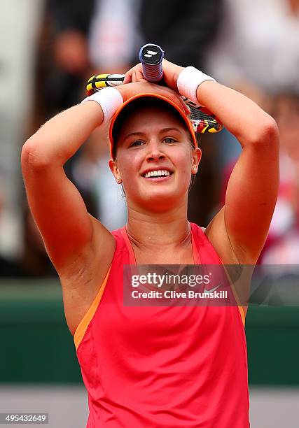 Eugenie Bouchard of Canada celebrates her win during her women's singles quarter-final match against Carla Suarez Navarro of Spain on day ten of the...
