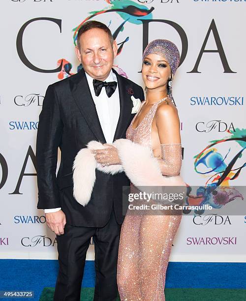 President of MAC Cosmetics John Dempsey and recipient of the 2014 CFDA Fashion Icon Award, Rihanna attends the 2014 CFDA fashion awards at Alice...