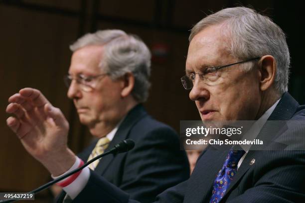 Senate Majority Leader Harry Reid and Senate Minority Leader Mitch McConnell testify before the Senate Judiciary Committee about political donations...