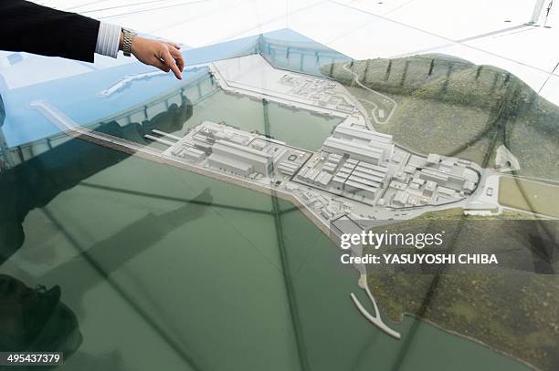 Scale model of the new submarine base under construction in Itaguai, some 70 km south from Rio de Janeiro, Brazil, on May 22, 2014. With 8500 km of...