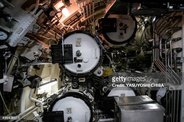 The torpedo/missiles tubes of the BNS S34 Tikuna Brazilian diesel-electric powered type 209 attack submarine during a drill while moored at the navy...