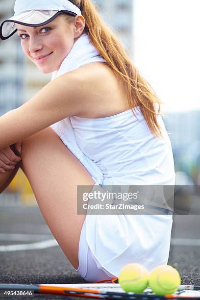 taking a break after the match - tennis outfit stock pictures, royalty-free photos & images