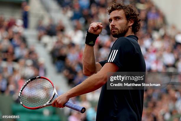 Ernests Gulbis of Latvia celebrates victory in his men's singles quarter-final match against Tomas Berdych of Czech Republic on day ten of the French...