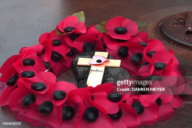 Wreath is left in front of a D-Day commemoration plaque and sculpture near the beach in Ouistreham, northwestern France, on June 3 ahead of the 70th...