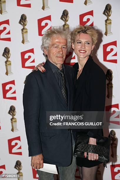 Stage director Jean-Luc Moreau and his wife, actress Mathilde Penin, poses as they arrive to attend the 26th Molieres theatre award ceremony on June...