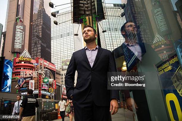 Zach Coopersmith, partner at Leading Ridge Capital Partners LLC, poses for a photograph in Times Square in New York, U.S., on Tuesday, September 1,...