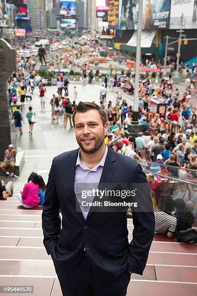 Zach Coopersmith, partner at Leading Ridge Capital Partners LLC, poses for a photograph in Times Square in New York, U.S., on Tuesday, September 1,...