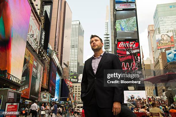 Zach Coopersmith, partner at Leading Ridge Capital Partners LLC, poses for a photograph in Times Square in New York, U.S., on Tuesday, September 1,...