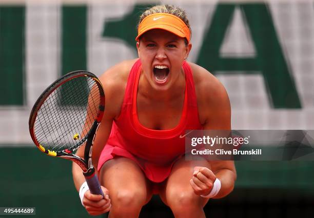 Eugenie Bouchard of Canada celebrates match point during her women's singles quarter-final match against Carla Suarez Navarro of Spain on day ten of...