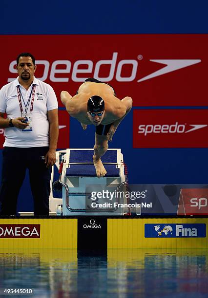 Hendrik Feldwehr of Germany competes in the Men's 100m Breaststroke heats during day two of the FINA World Swimming Cup 2015 at the Hamad Aquatic...