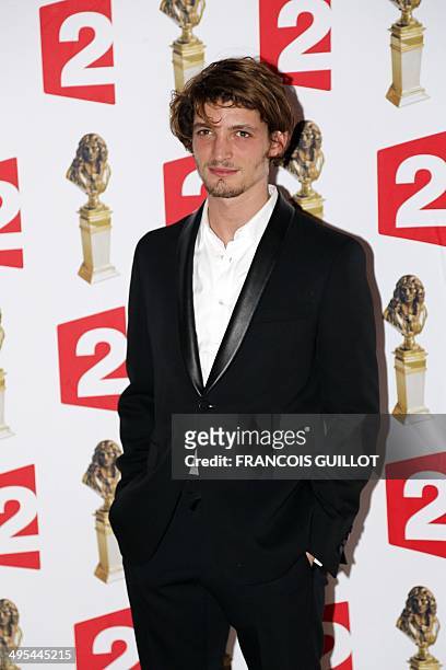 French/Canadian actor Niels Schneider poses as he arrives to attend the 26th Molieres theatre award ceremony on June 2, 2014 at the Folies Bergere...