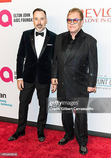 Filmmaker David Furnish and Sir Elton John attend Elton John AIDS Foundation's 14th Annual An Enduring Vision Benefit at Cipriani Wall Street on...