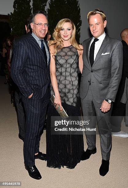 Andrew Saffir, Nina Arianda, and Daniel Benedict attend the 12th annual CFDA/Vogue Fashion Fund Awards at Spring Studios on November 2, 2015 in New...