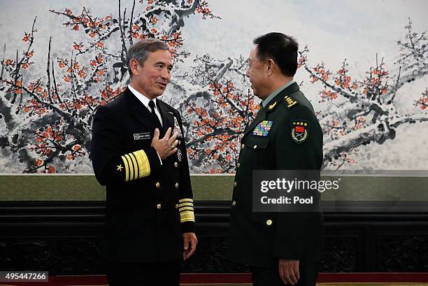 Adm. Harry B. Harris, Jr., U.S. Navy Commander, U.S. Pacific Command, left, chats with Fan Changlong, vice-chairman of China's Central Military...