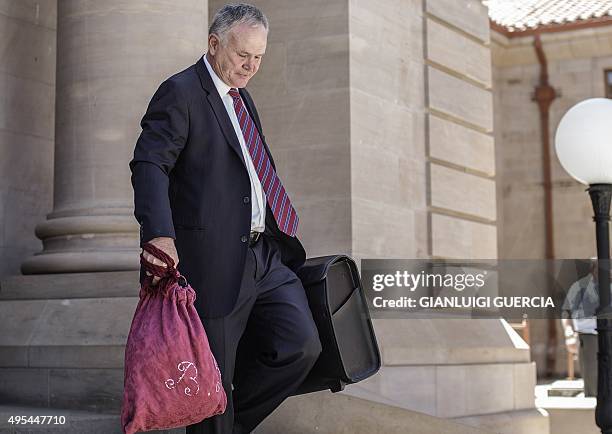 Oscar Pistorius's chief defense lawyer Barry Roux leaves the court of appeal at the end of proceedings of the state appealing against Oscar Pistorius...