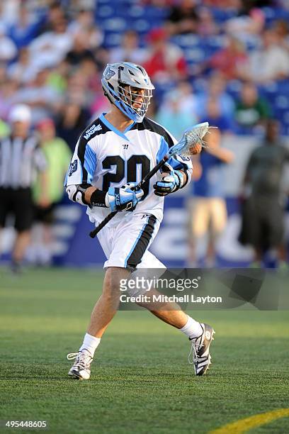 Logan Schuss of the Ohio Machine walks with the ball during a lacrosse game against the Chesapeake Bayhawks on May 31, 2014 at Navy-Marine Corps...