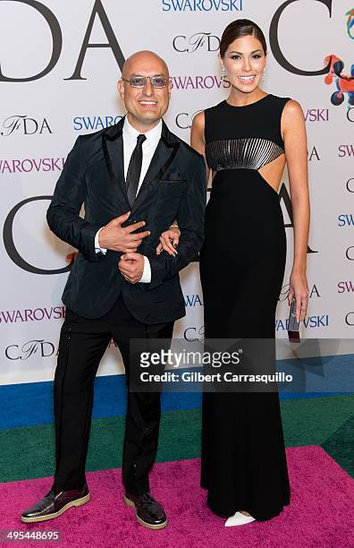 Designer Angel Sanchez and Miss Universe 2013 Gabriela Isler attend the 2014 CFDA fashion awards at Alice Tully Hall, Lincoln Center on June 2, 2014...
