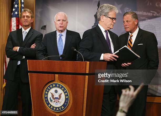 Senators Jeff Flake , John McCain , Tom Coburn and Richard Burr , participte in a news conference about veterans affairs on Capitol Hill, June 3,...
