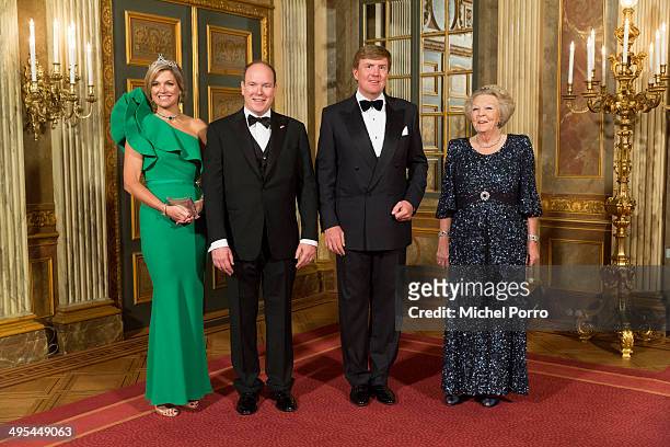 Queen Maxima of The Netherlands, King Willem-Alexander of The Netherlands, Prince Albert II of Monaco and Princess Beatrix of The Netherlands pose...