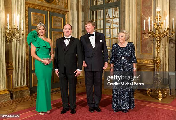 Queen Maxima of The Netherlands, King Willem-Alexander of The Netherlands, Prince Albert II of Monaco and Princess Beatrix of The Netherlands pose...