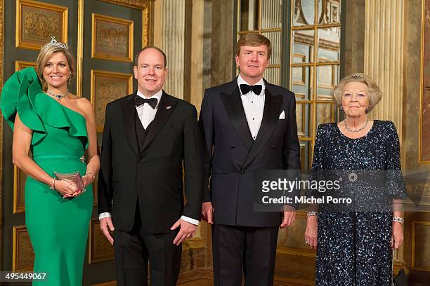 Queen Maxima of The Netherlands, King Willem-Alexander of The Netherlands, Prince Albert II of Monaco and Princess Beatrix of The Netherlands pose...