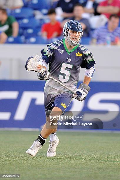 Kyle Dixon of the Chesapeake Bayhawks runs with the ball during a MLL lacrosse game against the Ohio Machine on May 31, 2014 at Navy-Marine Corps...