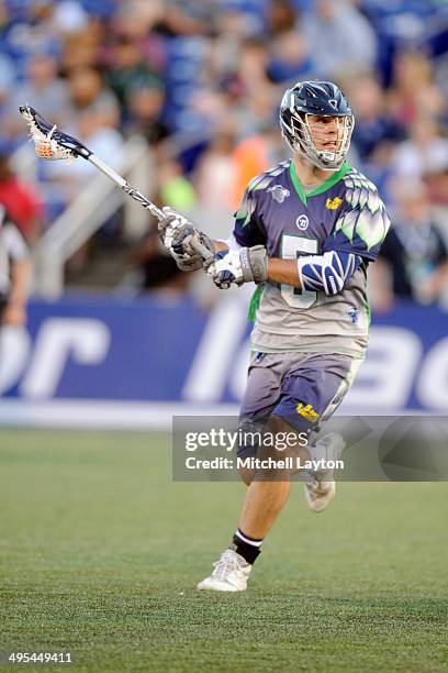 Kyle Dixon of the Chesapeake Bayhawks runs with the ball during a MLL lacrosse game against the Ohio Machine on May 31, 2014 at Navy-Marine Corps...