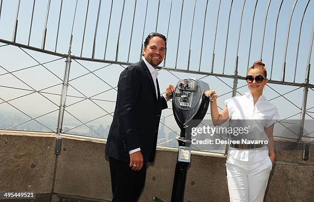Former NY Met and 12 Time MLB All-Star Mike Piazza and his wife Alicia Rickter visit The Empire State Building to celebrate the National Italian...