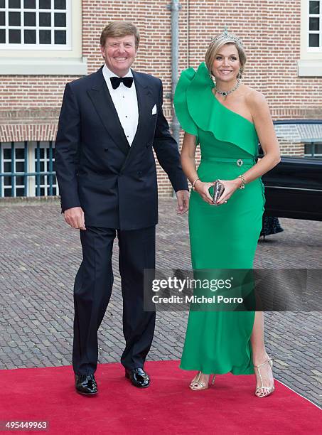 King Willem-Alexander of The Netherlands and Queen Maxima of The Netherlands arrive at the Loo Royal Palace for dinner on June 3, 2014 in Apeldoorn,...