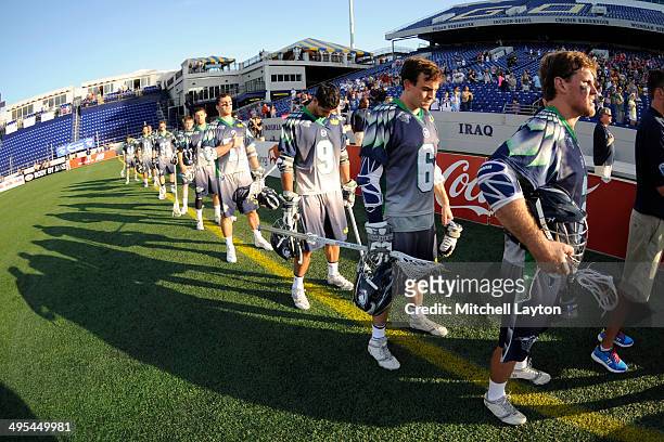 The Chesapeake Bayhawks line up for the national anthem before a MLL lacrosse game against the Ohio Machine on May 31, 2014 at Navy-Marine Corps...