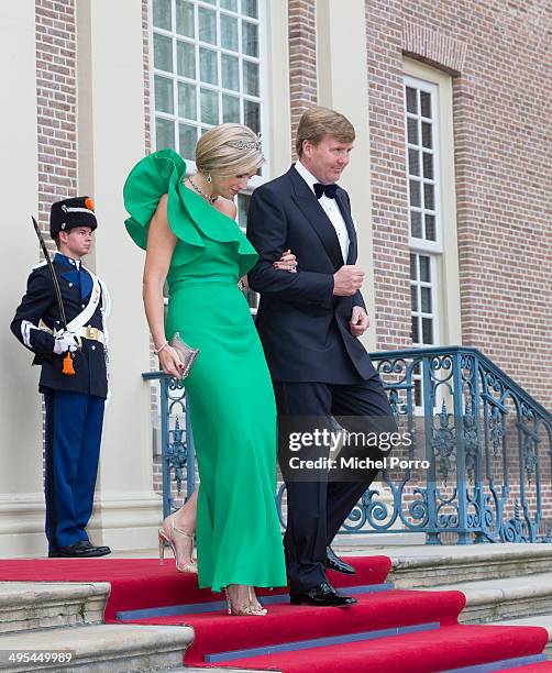 King Willem-Alexander of The Netherlands and Queen Maxima of The Netherlands arrive at the Loo Royal Palace for dinner on June 3, 2014 in Apeldoorn,...