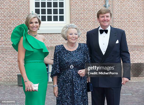 Queen Maxima of The Netherlands, Princess Beatrix of The Netherlands and King Willem-Alexander of The Netherlands arrive at the Loo Royal Palace for...