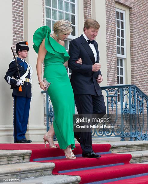 King Willem-Alexander of The Netherlands and Queen Maxima of The Netherlands arrive at the Loo Royal Palace for dinner on June 3, 2014 in Apeldoorn,...