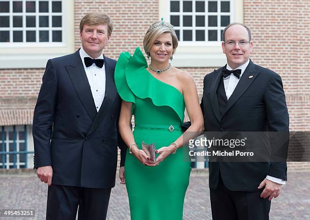 King Willem-Alexander of The Netherlands, Queen Maxima of The Netherlands and Prince Albert II of Monaco arrive for dinner at the Loo Royal Palace on...