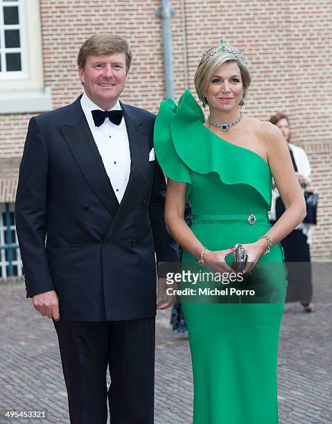 King Willem-Alexander of The Netherlands and Queen Maxima of The Netherlands arrive for dinner at the Loo Royal Palace on June 3, 2014 in Apeldoorn,...