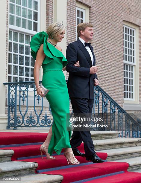 King Willem-Alexander of The Netherlands and Queen Maxima of The Netherlands arrive for dinner at the Loo Royal Palace on June 3, 2014 in Apeldoorn,...